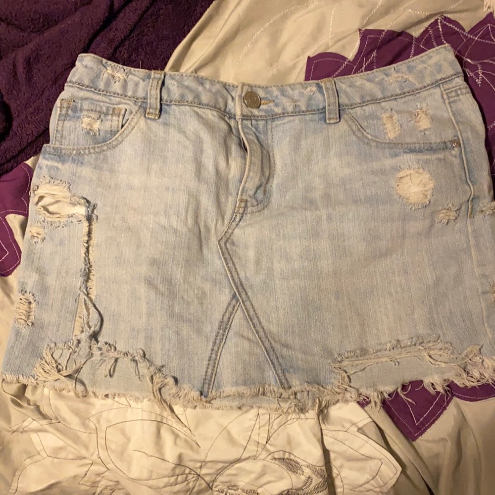 Blue jean skirt with rips size M